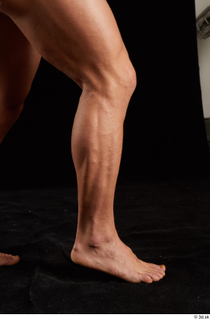 Dave  1 calf flexing nude side view 0006.jpg